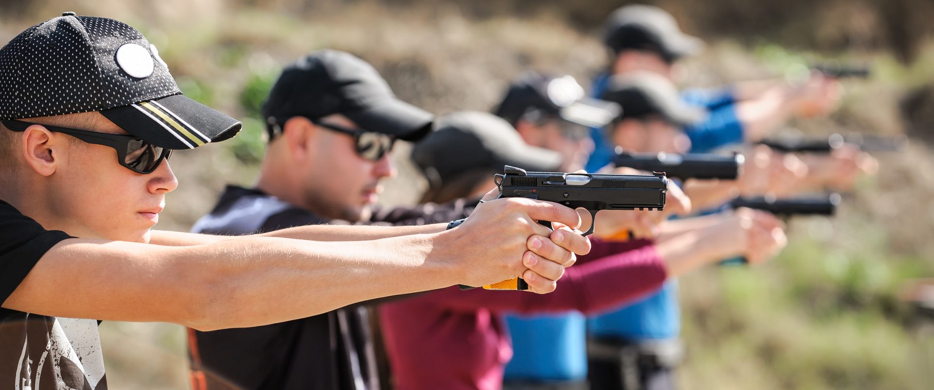Defensive handgun training class outdoors